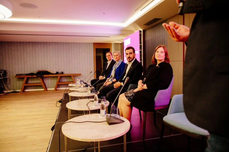 Jack Phillips and fellow panelists seated with microphones at the Balkan Tech Summit in Kotor, Montenegro